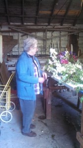 Joan putting the finishing touches on her spray